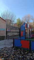 Red baja. Pista deportiva calle Familia